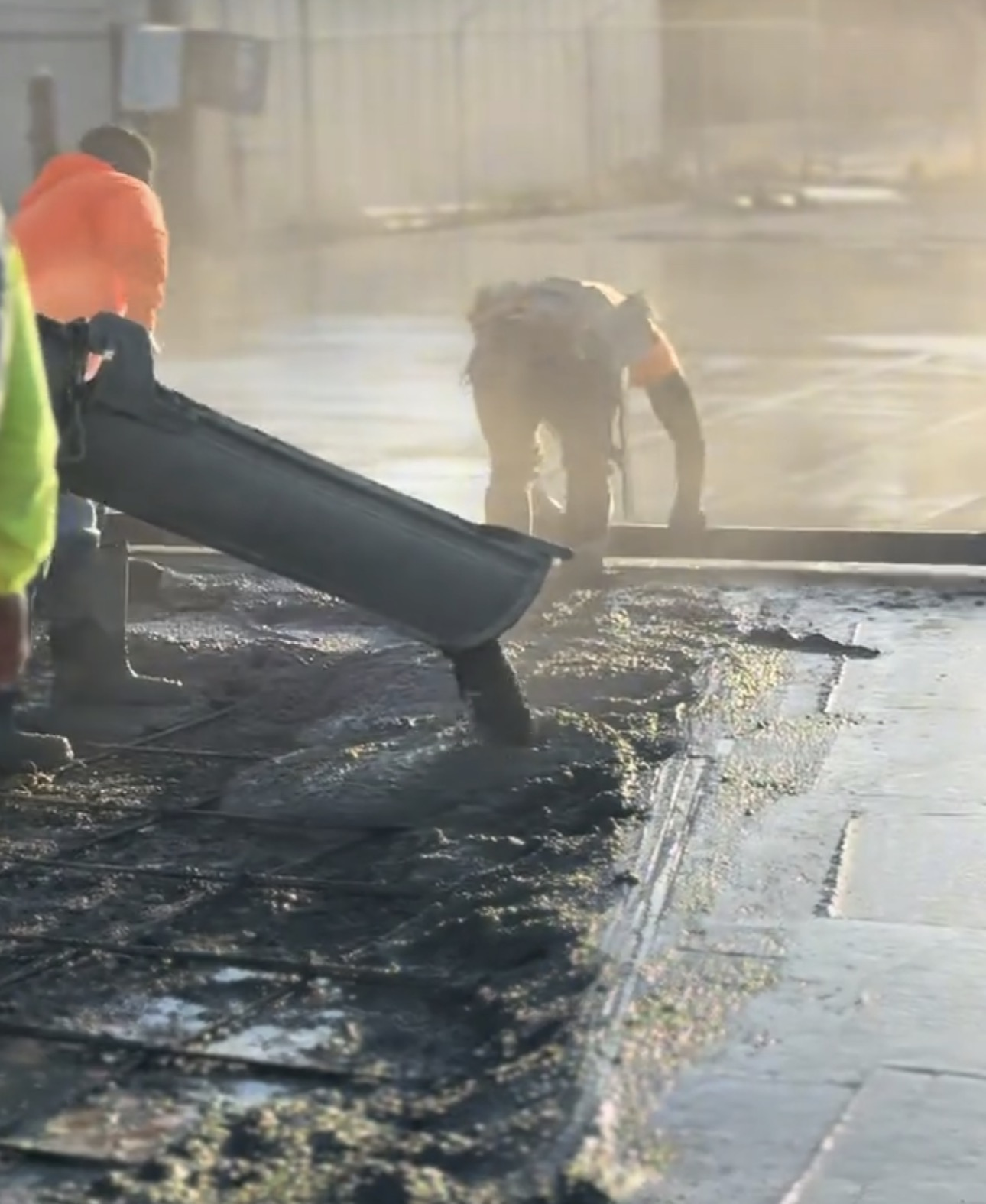 CG Concrete crew pouring concrete on jobsite